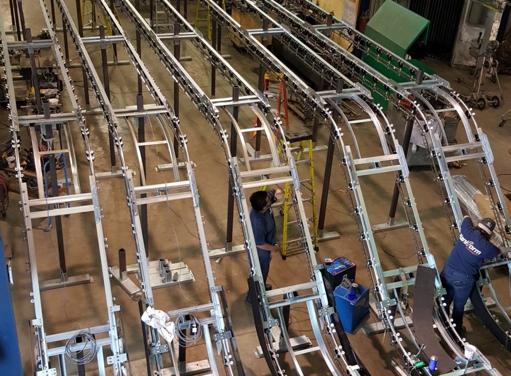 Installation of garment conveyor in Florida and Texas.